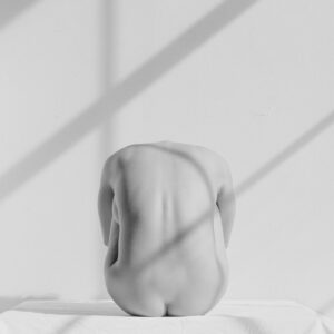 Nude woman in natural window light Reeva b&w photo by Craig Morey