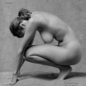 Nude woman crouched in studio, profile, Natalie b&w photo by Craig Morey